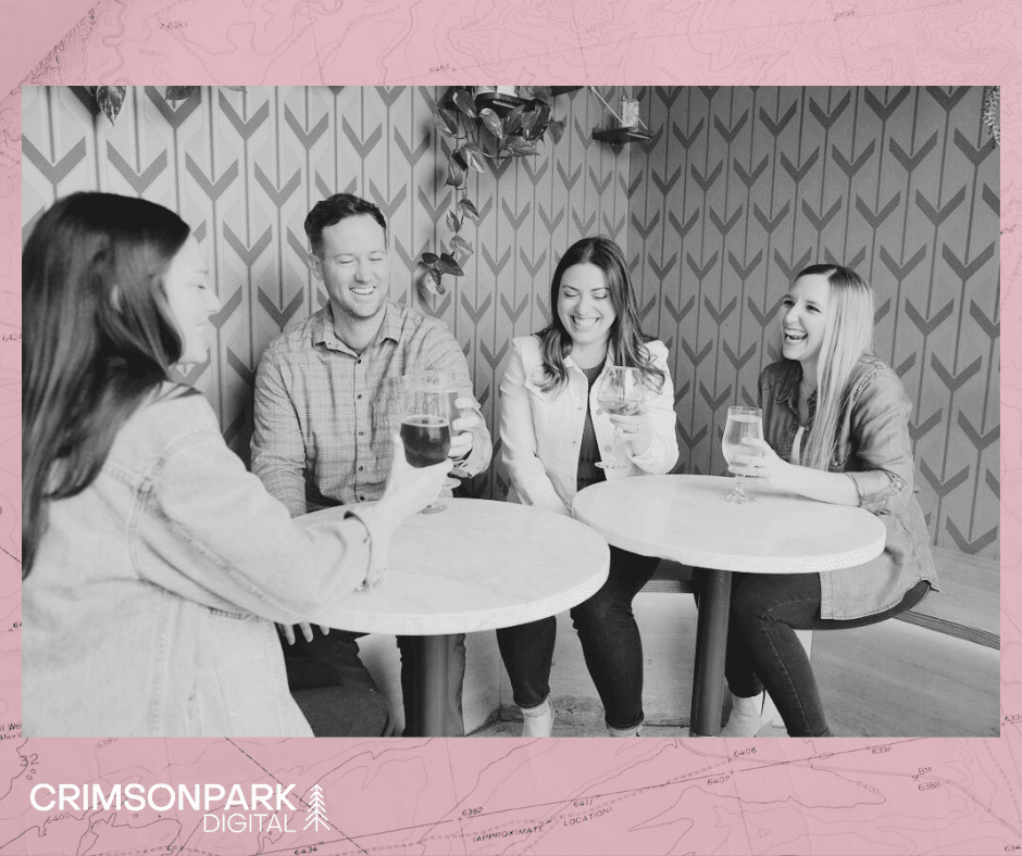 The Crimson Park Digital team does cheers with drinks