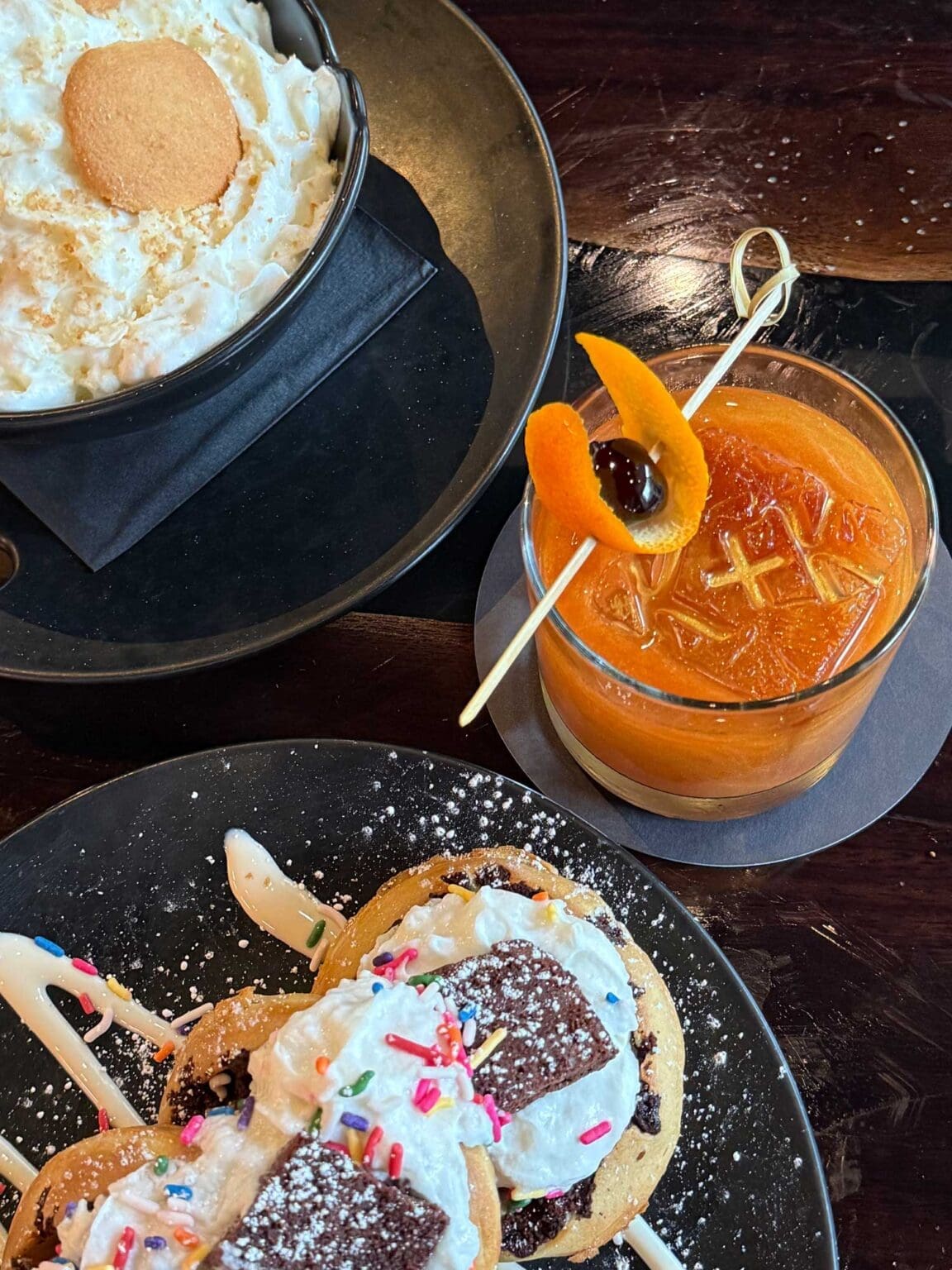 Cocktails and dishes at a restaurant opening